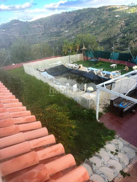 Foto c10f56df-e87f-4465-bfa3-8b46431fe169. Chalet finca rústica en guaro de 24.381m2 en Tolox