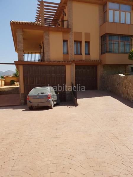 Foto 5a328310-f9dc-4058-88d6-64fde405f4e7. Xalet amb xemeneia aparcament piscina a Cártama