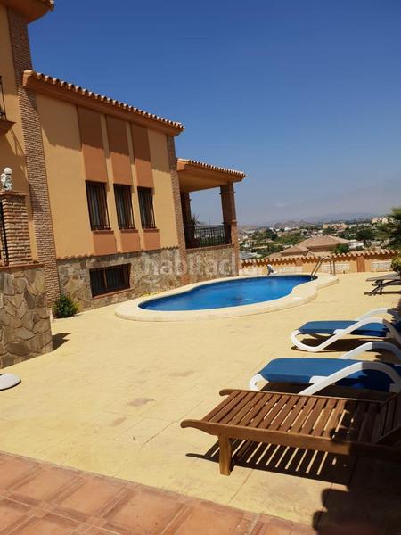 Foto 631f01d9-0b29-47de-bc8c-beeaf1c0bcad. Xalet amb xemeneia aparcament piscina a Cártama