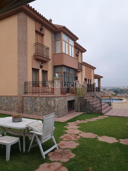 Foto ebb2dbe4-c8ee-49aa-a45a-03a012d8cae6. Xalet amb xemeneia aparcament piscina a Cártama