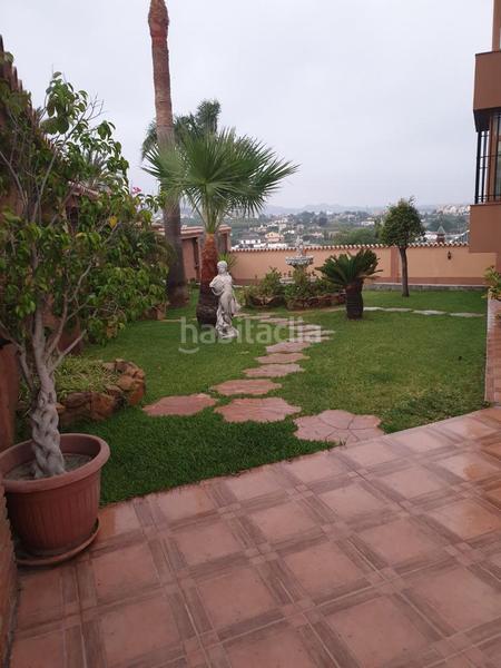 Foto f0bb1e1f-8e03-4129-b3cd-a2e0d0ee3a01. Xalet amb xemeneia aparcament piscina a Cártama