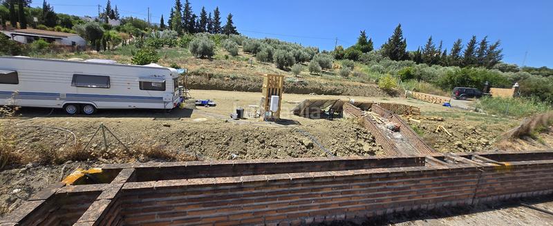 Foto 6771273a-730b-4a3f-a1ca-8c19a127efda. Chalet con parcheggio piscina in Centro Alhaurín el Grande