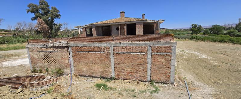 Foto 73d4386c-39d0-4968-870c-1bb94f5e716d. Chalet con parcheggio piscina in Centro Alhaurín el Grande