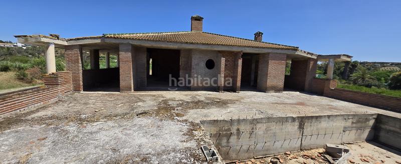 Foto ef6d8b89-2133-4be6-b3a4-db18ff823d10. Chalet con parcheggio piscina in Centro Alhaurín el Grande