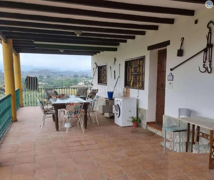 Foto 5371ea9e-9109-4a0a-ad03-2148b8c92f75. Xalet amb xemeneia aparcament a Coín