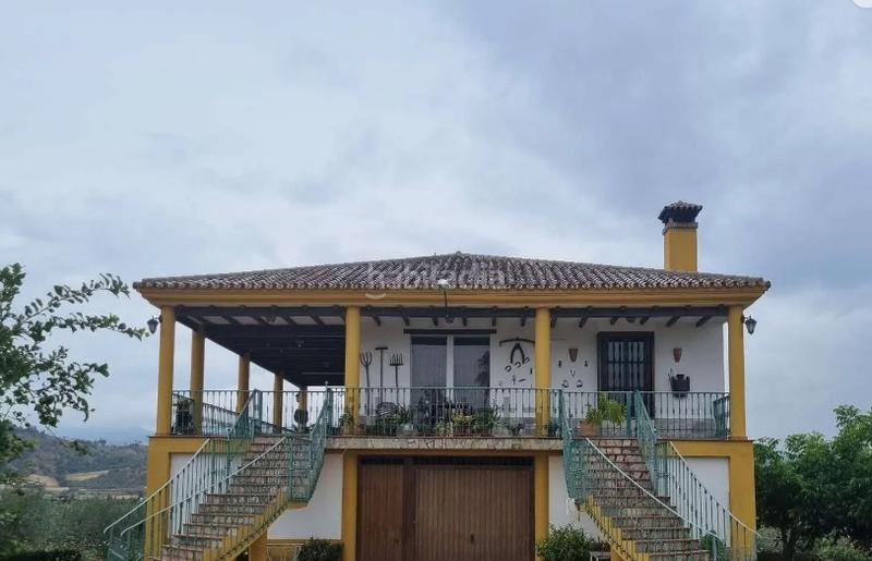 Foto 93f2929f-61bf-4db8-adc6-0869002f534d. Xalet amb xemeneia aparcament a Coín