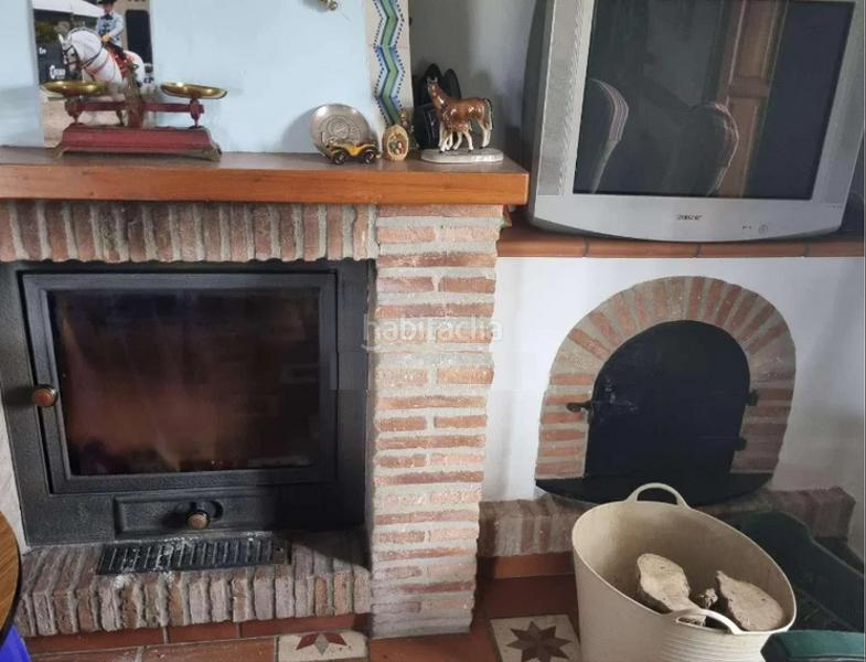 Foto dbe2372c-f752-444f-912d-f259764d2eaf. Xalet amb xemeneia aparcament a Coín