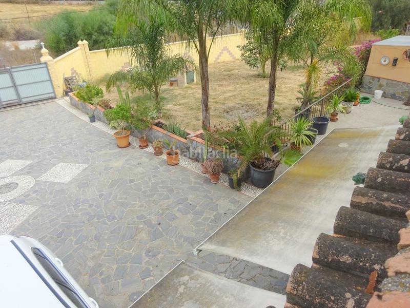 Foto b687652f-ce7b-4b8e-aad9-a4165ff22796. Chalet con camino parcheggio piscina in El Romeral-Peñón de Zapata Alhaurín de la Torre