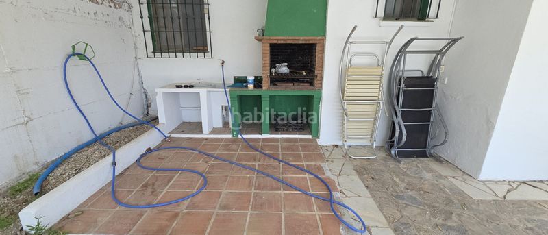 Foto f413ff9d-e713-468c-af93-492a773d76f3. Xalet amb xemeneia aparcament piscina a Coín
