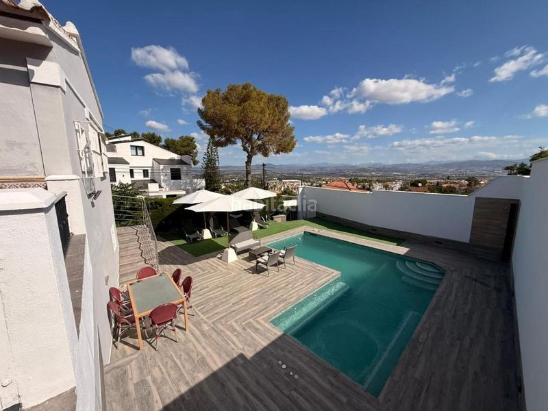 Foto 4914ece8-3082-46aa-a683-243e1b4ac09c. Rent chalet with fireplace heating parking pool in Alhaurín de la Torre