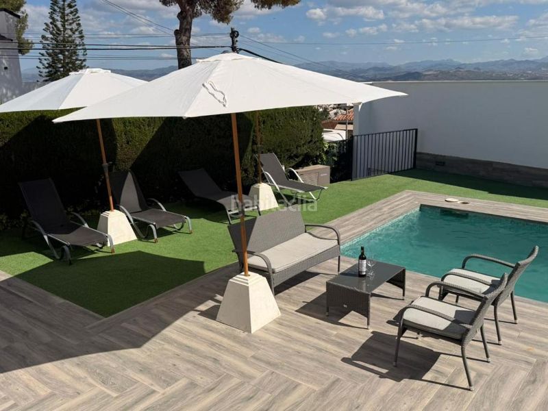 Foto d1e2b631-0815-4677-9847-d9653e6079d3. Rent chalet with fireplace heating parking pool in Alhaurín de la Torre