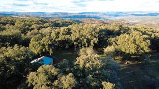 Finca rústica a Puerto Moral. Finca de 11 has de encinas, alcornoques, pozo y vistas