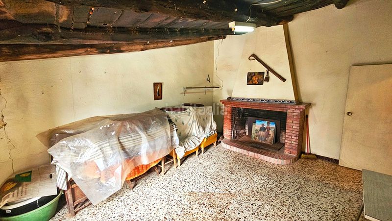 Foto b7fe1bee-d0fa-4135-aa7e-a15c24e202bc. Casa amb xemeneia aparcament a Fuenteheridos