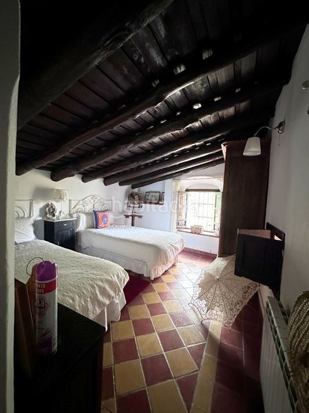 Foto ce89604b-ba12-4d42-9bd2-0f820e7f892e. Casa amb xemeneia aparcament piscina a Aracena