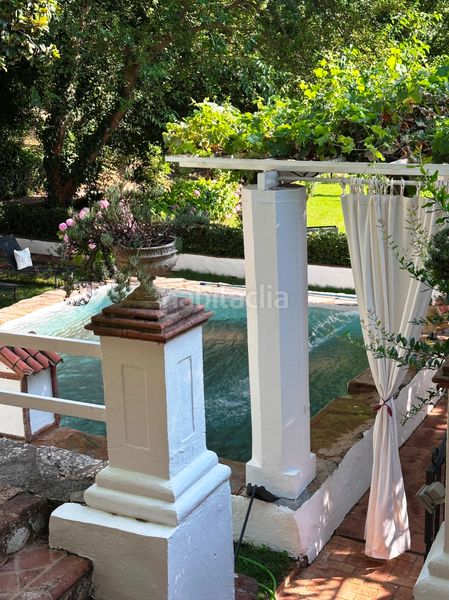 Foto f08e3a92-ec6d-4284-9e11-c4f0b7121860. Casa amb xemeneia aparcament piscina a Aracena