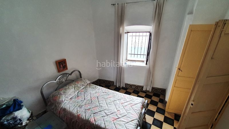 Foto dc6cf598-82f6-452b-b6d5-5cfb17934a10. Casa amb xemeneia a Aroche