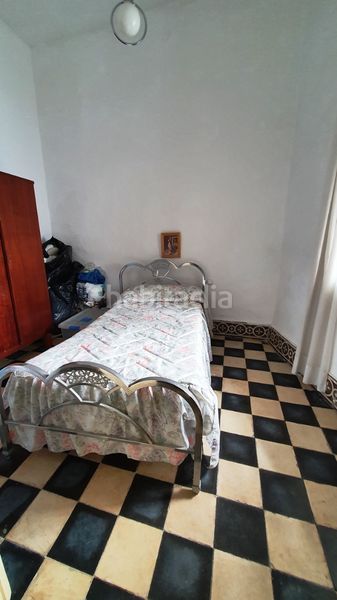 Foto f1f3dac1-8f4f-422d-bcb0-785e07ec756e. Casa amb xemeneia a Aroche