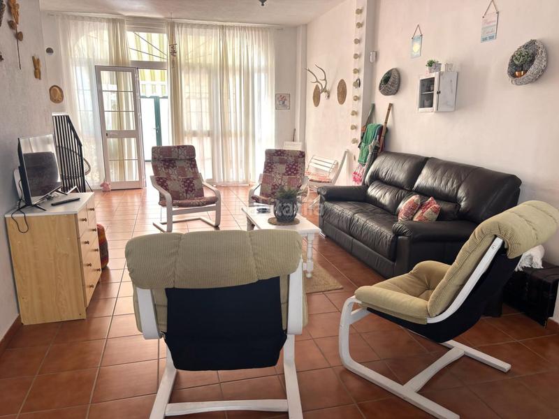 Foto d2070c8d-05bf-4ab3-8b0f-c6fc18255f93. Casa adosada en El Portil