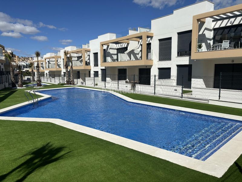 Foto 2912c7d9-a6f8-4d4e-b313-b0ab31ad4dd9. Apartament amb aparcament piscina a Los Almendros Orihuela