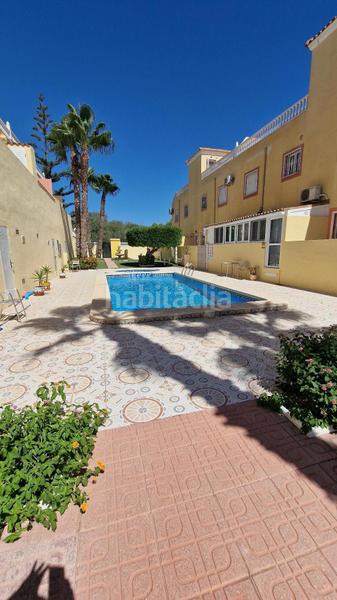 Foto 9ccf705d-8c12-4ec8-9335-150cf269ca2b. Casa amb calefacció aparcament piscina a Villamartín-Las Filipinas Orihuela