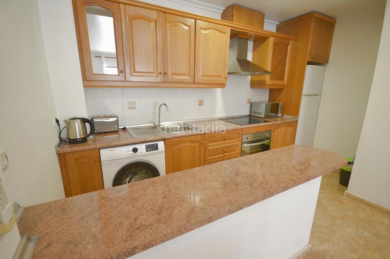 Foto 48ba7a8b-8d54-4d65-aa60-3bd7886812fb. Apartament amb calefacció aparcament piscina a Aguamarina Orihuela