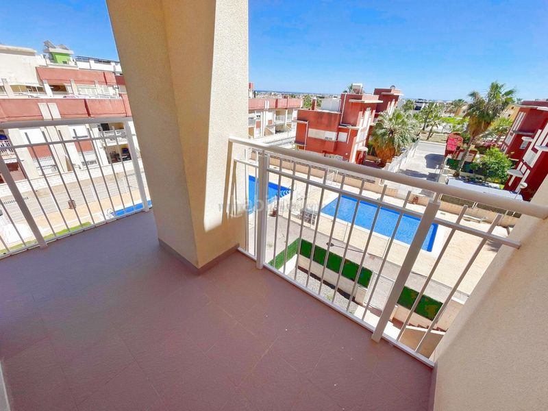 Foto 9ac3f2ec-bd6e-4fb0-9ccd-50f55de98cda. Apartament amb calefacció piscina a Lomas de Cabo Roig - Los Dolses Orihuela