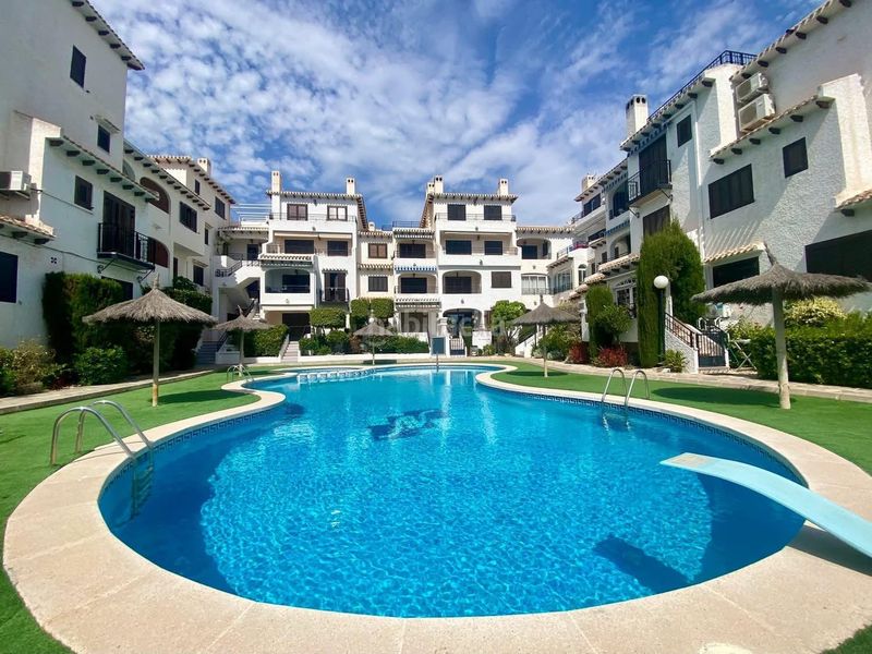 Foto 17cbbd6b-c775-4d79-9e42-deaa8eff649f. Apartament amb calefacció piscina a Cabo Roig Orihuela