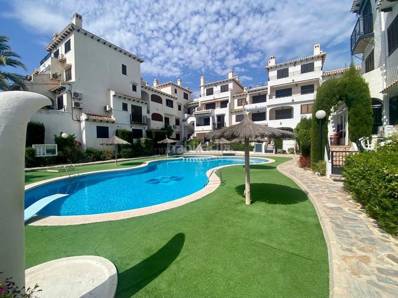 Foto 826c643a-a33f-40ed-b065-89cab5bd8352. Apartament amb calefacció piscina a Cabo Roig Orihuela