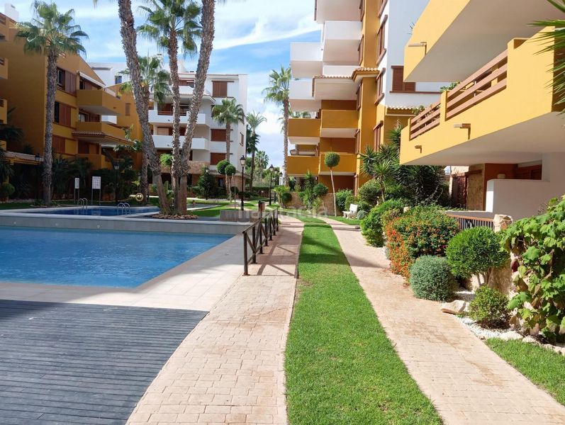 Foto 9a2aeac9-9eb4-42c6-a34f-196ef97c09c7. Apartament amb calefacció aparcament piscina a Punta Prima Torrevieja