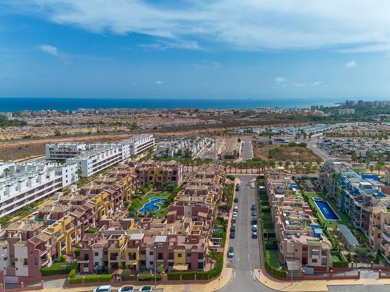 Foto da240636-f0c5-4ba8-a4f9-a55dc5e9e614. Apartament amb calefacció piscina a Lomas de Cabo Roig - Los Dolses Orihuela