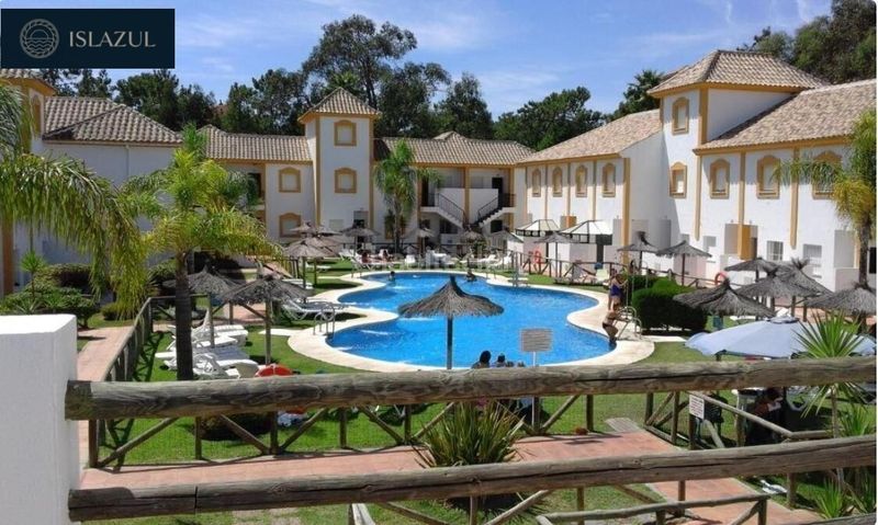 Foto 0df11f78-8564-4b9a-8b20-e7f760172064. Xalet amb aparcament piscina a Islantilla golf Islantilla