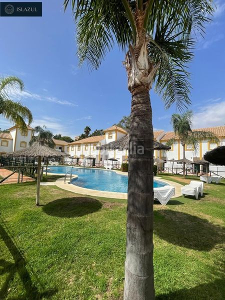 Foto 328198b2-5dde-4a6c-8b3c-7664e2db862f. Xalet amb aparcament piscina a Islantilla golf Islantilla
