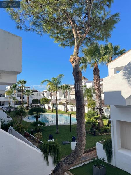 Foto 41283369-7135-40ba-9ee7-8b2f0c2822fc. Àtic amb calefacció aparcament piscina a Islantilla golf Islantilla