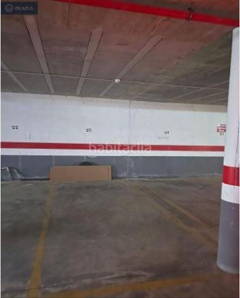 Foto 5051b99f-8ec0-41dd-a3c3-7279d7d7fc17. Parking coche plaza de garaje subterranea edificio playa en Isla Cristina