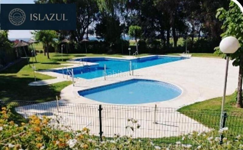Foto 89a70a1e-7d0d-4977-8b1f-4de8df9d834c. Apartment with parking pool in Islantilla golf Islantilla
