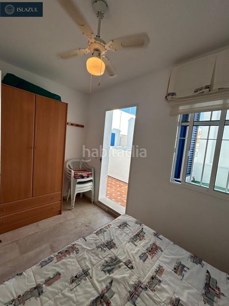 Foto c5d8dc78-8c6b-42d9-aa06-f153cc668a6c. Casa adossada amb aparcament a Isla Cristina