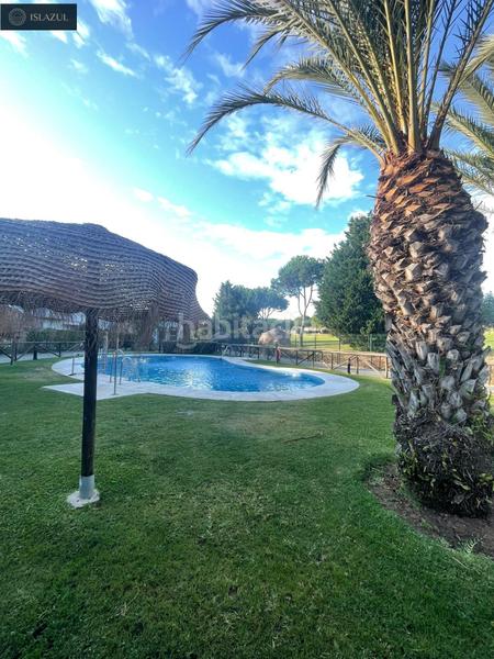 Foto c3689ae0-014b-4c10-86a0-34651cd7e754. Apartament amb aparcament piscina a Islantilla golf Islantilla