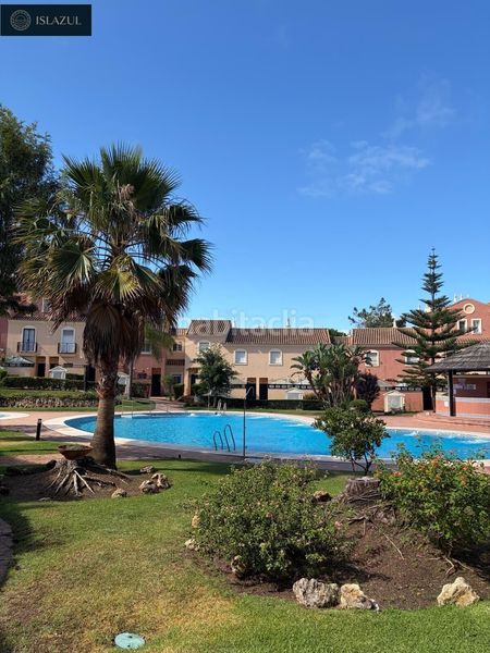 Foto 1e1ca10e-05c4-48b2-ba9f-e2a688d65f6e. Casa adossada amb calefacció aparcament piscina a Islantilla