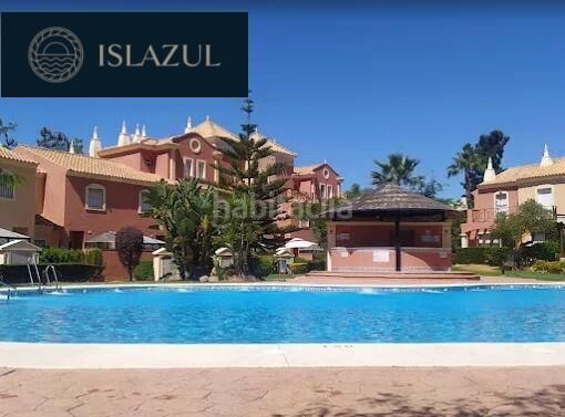 Foto 76f39138-46b3-4dd3-be5e-1a42501d995f. Casa adossada amb calefacció aparcament piscina a Islantilla