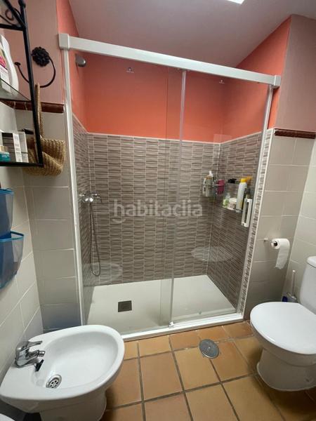 Foto 0a53ce39-ffbf-4b63-b25c-7bc44b3ffa77. Semi detached house with parking pool in Islantilla golf Islantilla