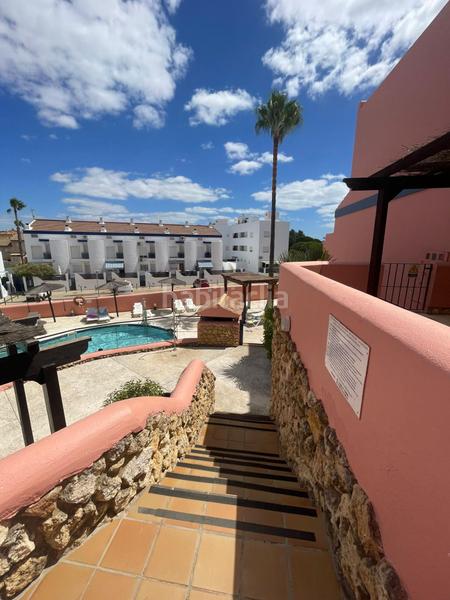 Foto 208ffaca-f00e-4ae0-8cba-1ce8a70e3b54. Semi detached house with parking pool in Islantilla golf Islantilla