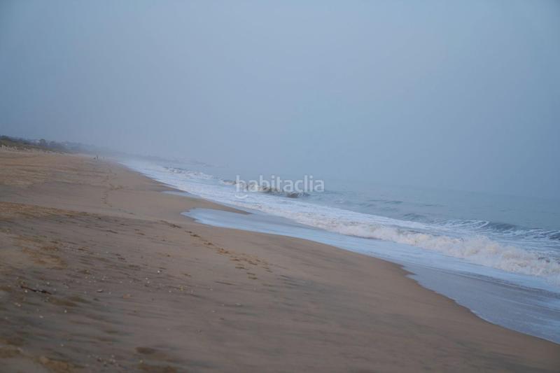 Foto 4891db5a-2b9f-489f-ab6b-99266f72f0a1. Semi detached house with parking pool in Islantilla golf Islantilla