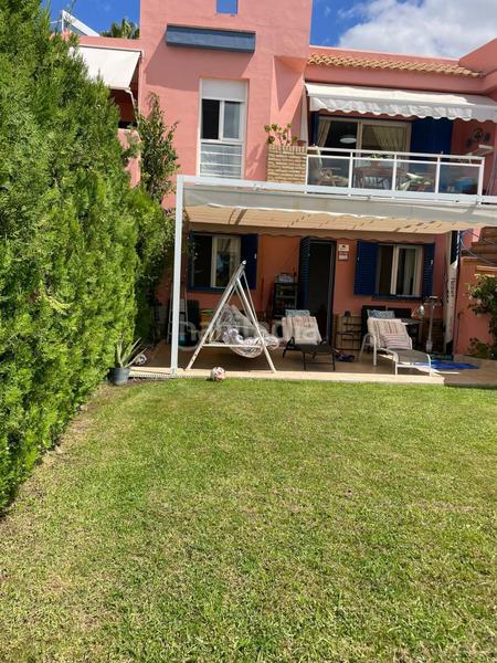 Foto 5d39f1c0-7e82-4d1e-b974-92bbd56e0b9d. Semi detached house with parking pool in Islantilla golf Islantilla