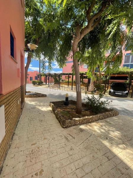 Foto 62b3b382-da88-460f-b277-b2768668ae1e. Semi detached house with parking pool in Islantilla golf Islantilla