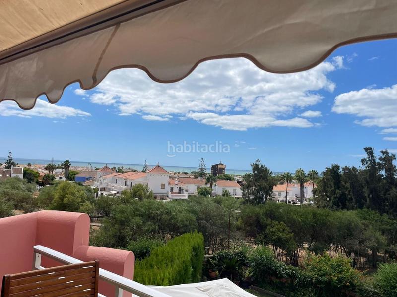 Foto b509e4af-5aa0-4833-ba51-624d79ad6769. Semi detached house with parking pool in Islantilla golf Islantilla