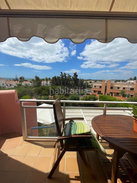 Foto d219b82c-bf67-4728-aae9-025d8049a3c8. Semi detached house with parking pool in Islantilla golf Islantilla