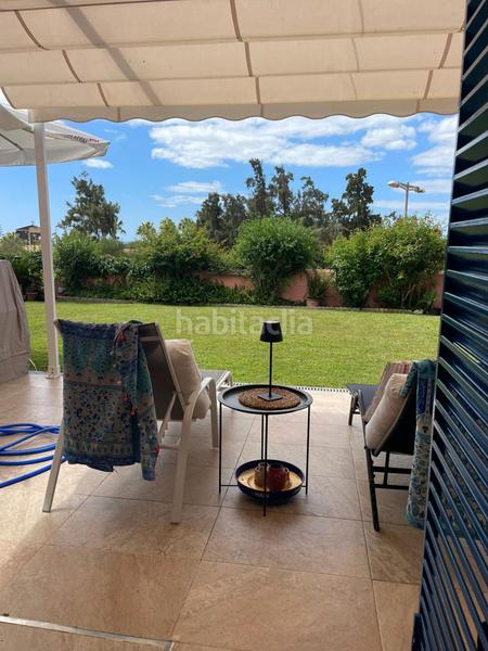 Foto ecd66159-172a-42f1-8e9b-422c3290262f. Semi detached house with parking pool in Islantilla golf Islantilla