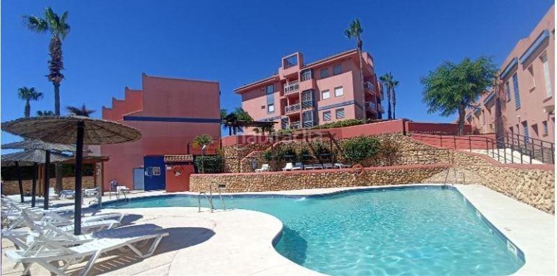 Foto ecf74967-7830-44fa-886c-6fd00f88e945. Semi detached house with parking pool in Islantilla golf Islantilla