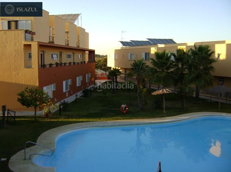 Foto 03fd666b-89f7-4d45-a7ce-153857ca8c9d. Duplex avec parking piscine dans Islantilla golf Islantilla