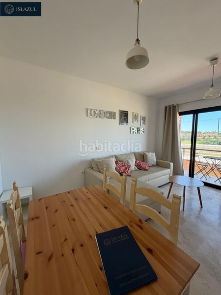 Foto 69c46e45-081f-475d-82ac-49bf40b6e1d9. Duplex avec parking piscine dans Islantilla golf Islantilla